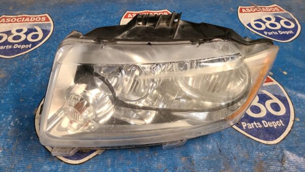 foco izquierdo Grand cherokee 11-13 07702 rack F1 (bodega)