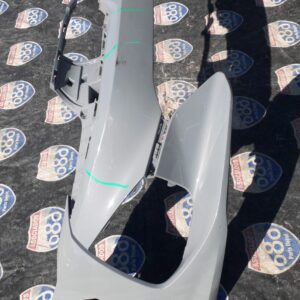 Kia K5 2021 B-9027 defensa delante
