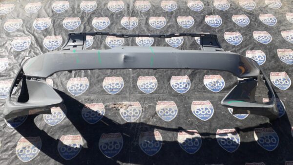 Kia K5 2021 B-9027 defensa delante